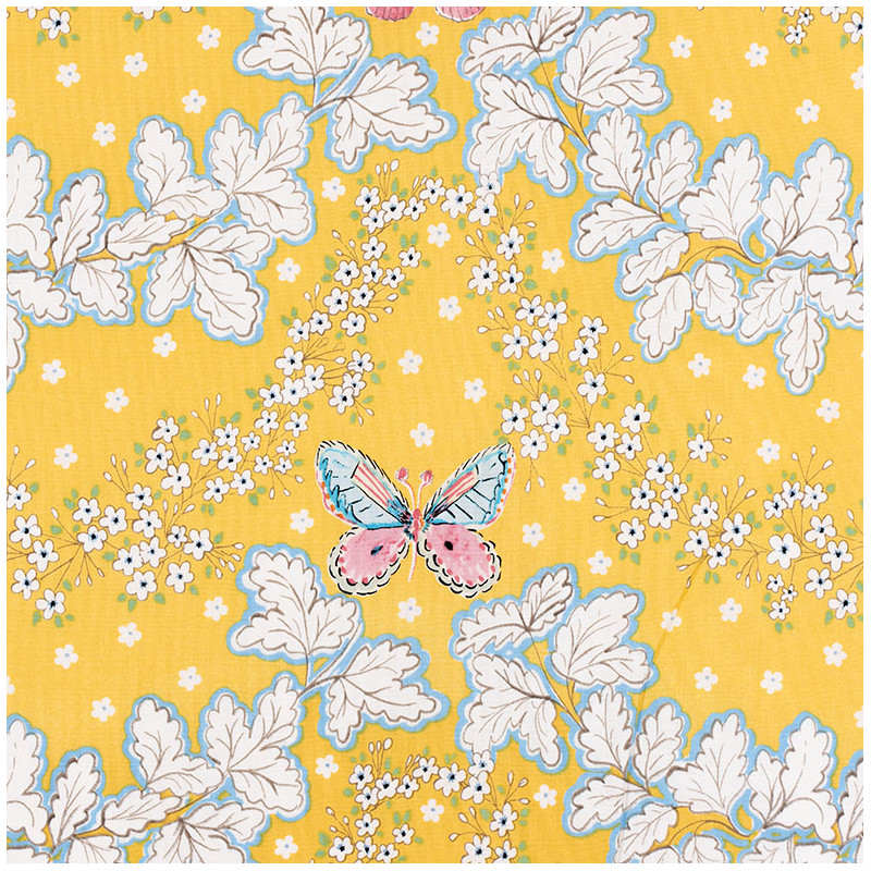 Yellow cotton fabric with a butterfly print