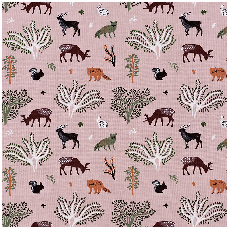 Pink cotton fabric with a forest animals print